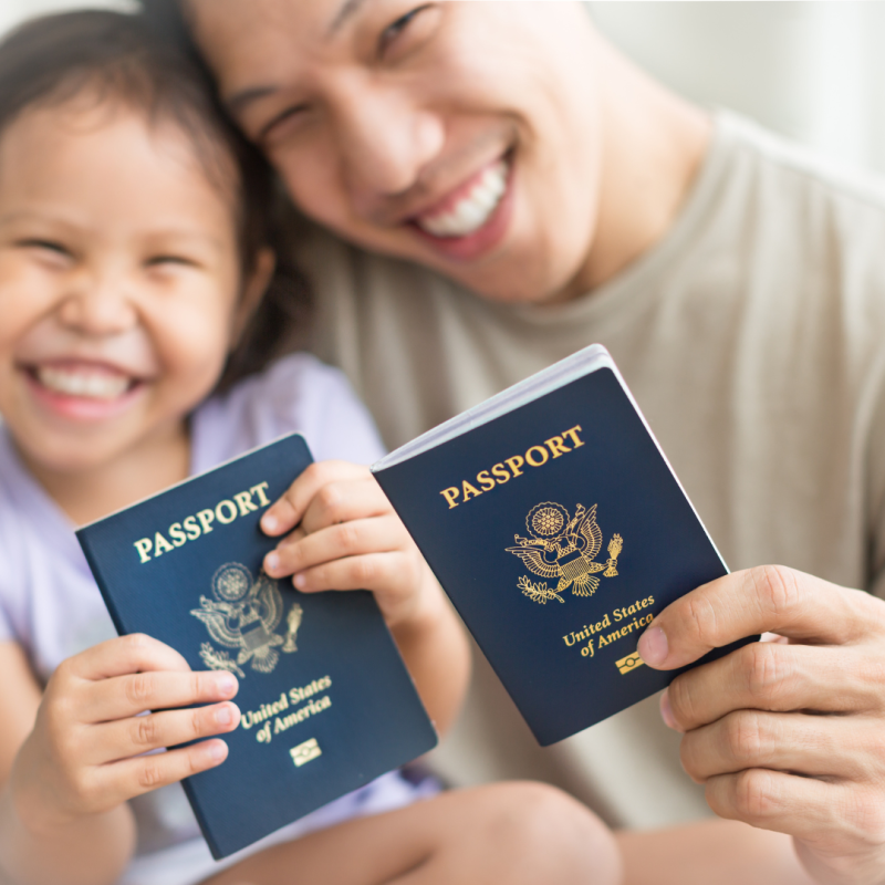 parent and child with passports