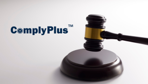 A judge’s gavel rests on a sound block next to the “ComplyPlus” logo on a plain background.