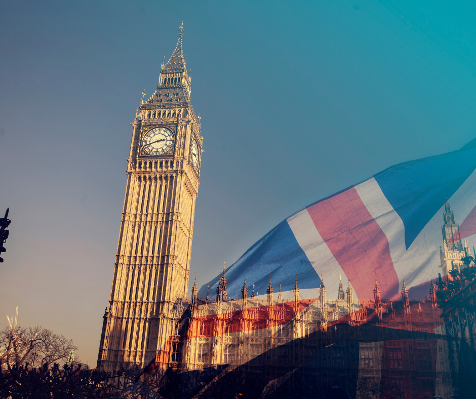 UK immigration update: iconic Big Ben clock tower with Union Jack flag reflecting recent changes to immigration sponsorship rules